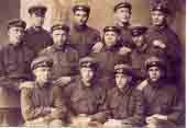 13. Групповое фото пограничников 22 отдельной Ветринской погранкомендатуры ОГПУ Ленинградского ВО. 1931 год. В среднем ряду второй слева - мой отец Метелев Михаил Александрович.